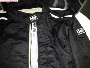 Mono omp first s homologado fia talla 54