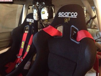 Pareja backets sparco rev y arneses omp