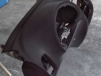 Reparación y flockado de salpicaderos