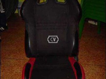 Vendo baquet reclinable rojo y negro como nuevo