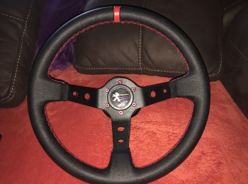 Volante desplazado tres brazos y piña  y tornilleria