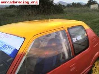 205 gti autocross y opel vectra de calle.