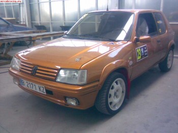 205 rally restaurado precioso con cuero negro 