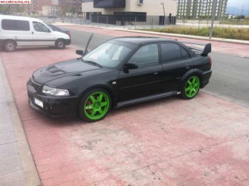 Carisma evolution 6 gt,recojo coche parte pago