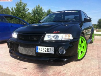 Carisma evolution 6 gt,recojo coche parte pago