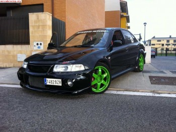 Carisma evolution 6 gt,recojo coche parte pago