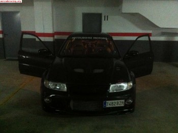 Carisma evolution 6 gt,recojo coche parte pago