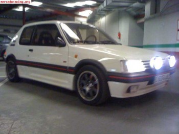 205 gti restaurado y con muchos extras (cambio)