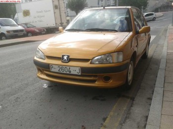 106 sport  se vende o se cambia por moto o quad coche