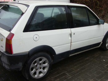 Compro carroceria documentada de ax gti economica