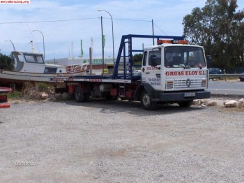 Se vende camion con plataforma deslizante para 3 vehiculos