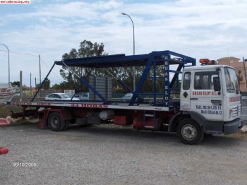 Se vende camion con plataforma deslizante para 3 vehiculos