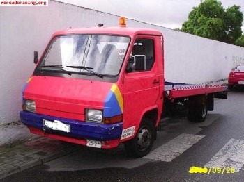 Vendo grua portavehiculos nissan trade 2.8 pma 3.500kg carne