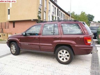 Vendo grand gherokee limited 4.7 v8 o cambio por 205 rallye 