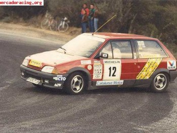 Busco coche de competcion ax corsa etc. q sea barato q es pa