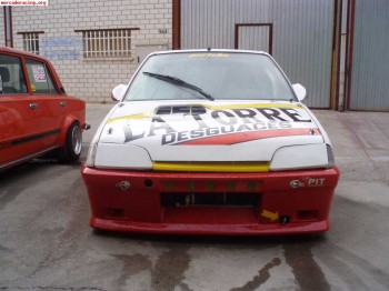 Compro culata 205rally y spoiler-parachoques de ax gra 1/2