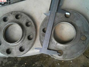 Cambio separadores por llanta de saxo