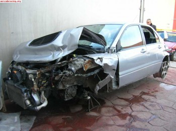 Vendo siniestro documentado de mitsubishi lancer evo viii añ
