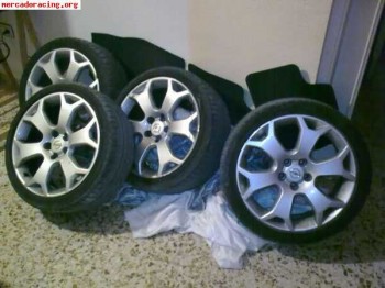 Cambio llantas y asientos por coche.. valor aprox: 3000