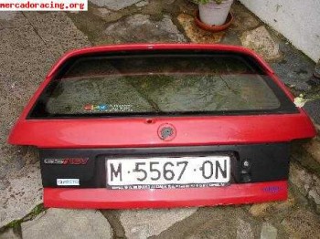 Porton con laeron de astra gsi rojo