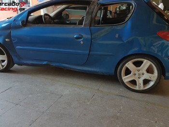 Vendo siniestro  y tambien carroceria 206 con barras omp hom