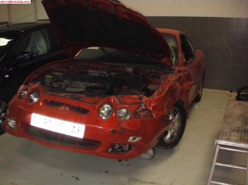 Vendo hyundai coupe con golpe lateral-delantero