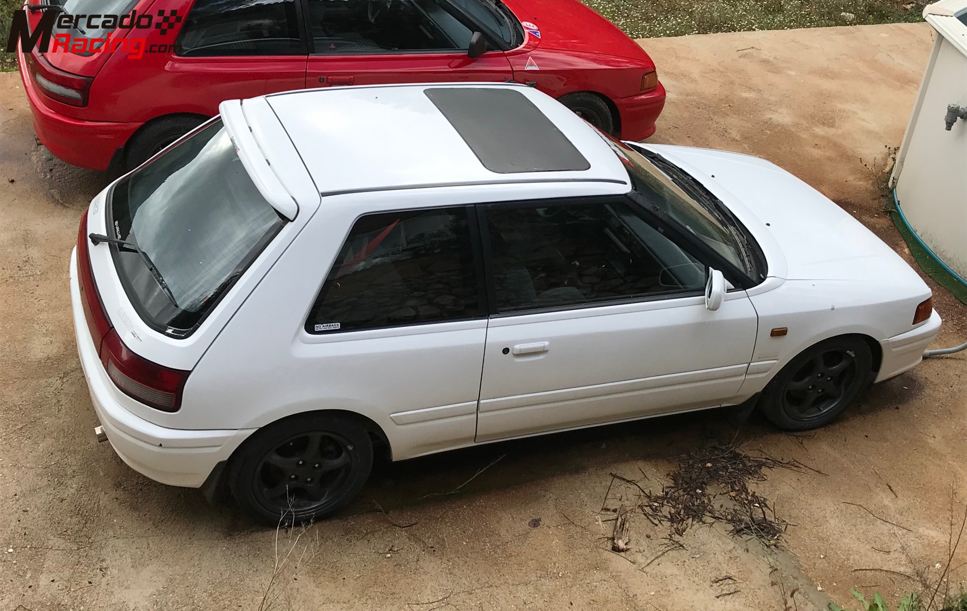 Dos Mazda 323 GT Dos Mazda 323 GT