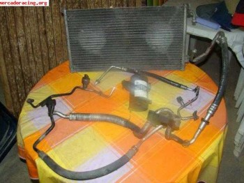 Se vende o se cambia aire acondicionado saxo vts