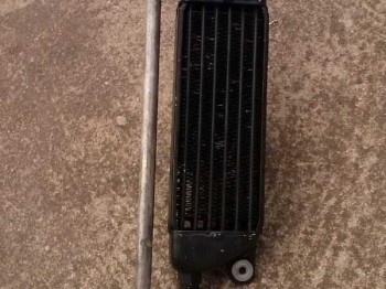 Radiador de aceite con sandwichera