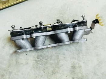 Se vende colector de admision de 205 rallye