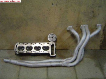 Culata completa con arbol de levas 304º, polea y colector es