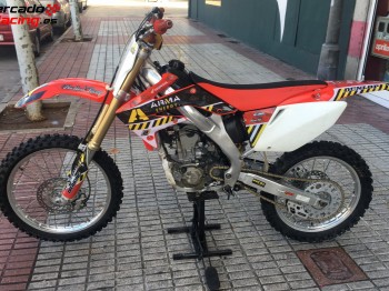 Vende o cambia honda crf 250r