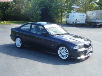 Bmw 328i y suzuki ltz 400