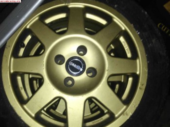 Se vende 4 llantas speeline doradas 15  para golf gti 4 torn