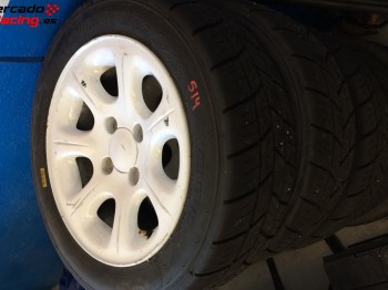 Se venden 4 llantas de saxo vts con 4 sliks mixtos hankook c