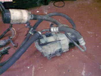 Bomba direccion saxo y volante desplazado.