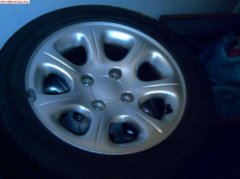 Vendo llantas de serie de saxo vts 16v!!!!
