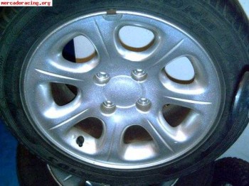 Vendo llantas de serie de saxo vts 16v!!!!