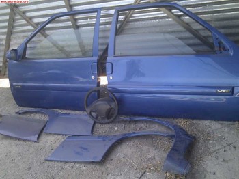 Puertas, molduras, taloneras, volante con air bag