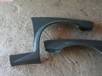 Aletas y defensa citroen ax gra 1/2 ( fibra a estrenar)