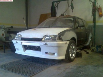 Cambio defensa y capó ax a 1/2  por material 124/2000