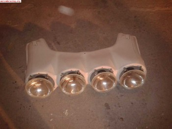 Parrilla de faros mitsubishi evo 5 y 6