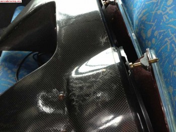 Parrilla de faros y cuneteros de carbono renault sport 